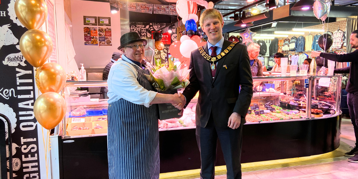 Adrian shaking hands with Mayor of Preston