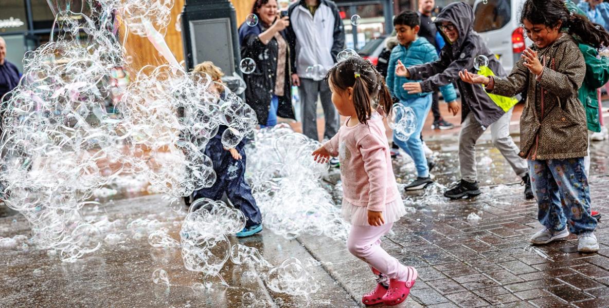 Children playing with bubbles