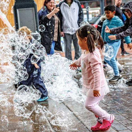 Children playing with bubbles