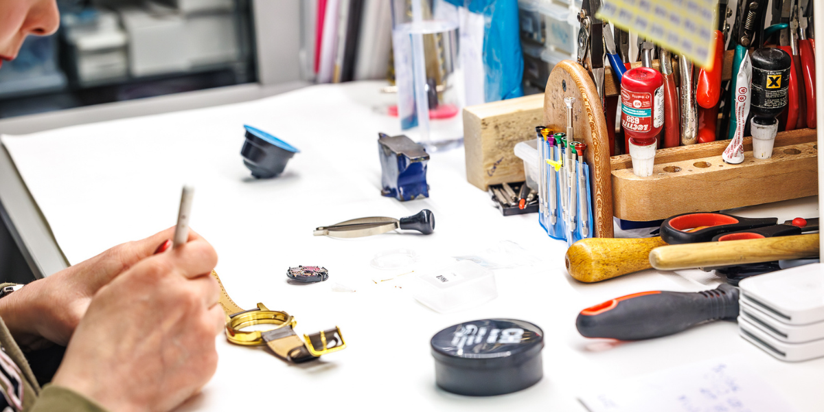 Trader repairing watch