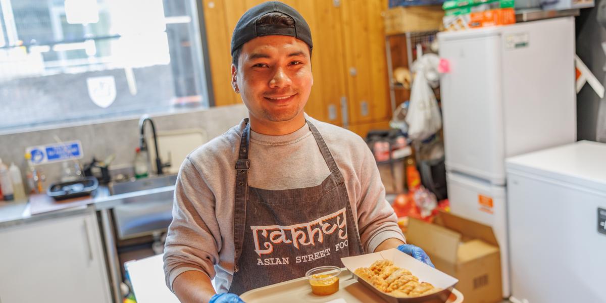 Nischal of Lakhey Street Food serving up a dish