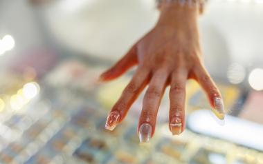 A person's hand showing off their new nails from Amber Nails