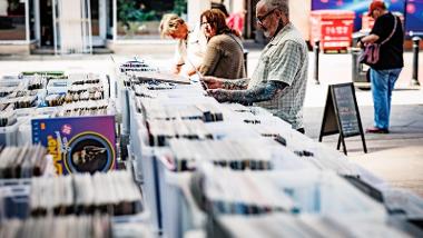 People browsing through LPs